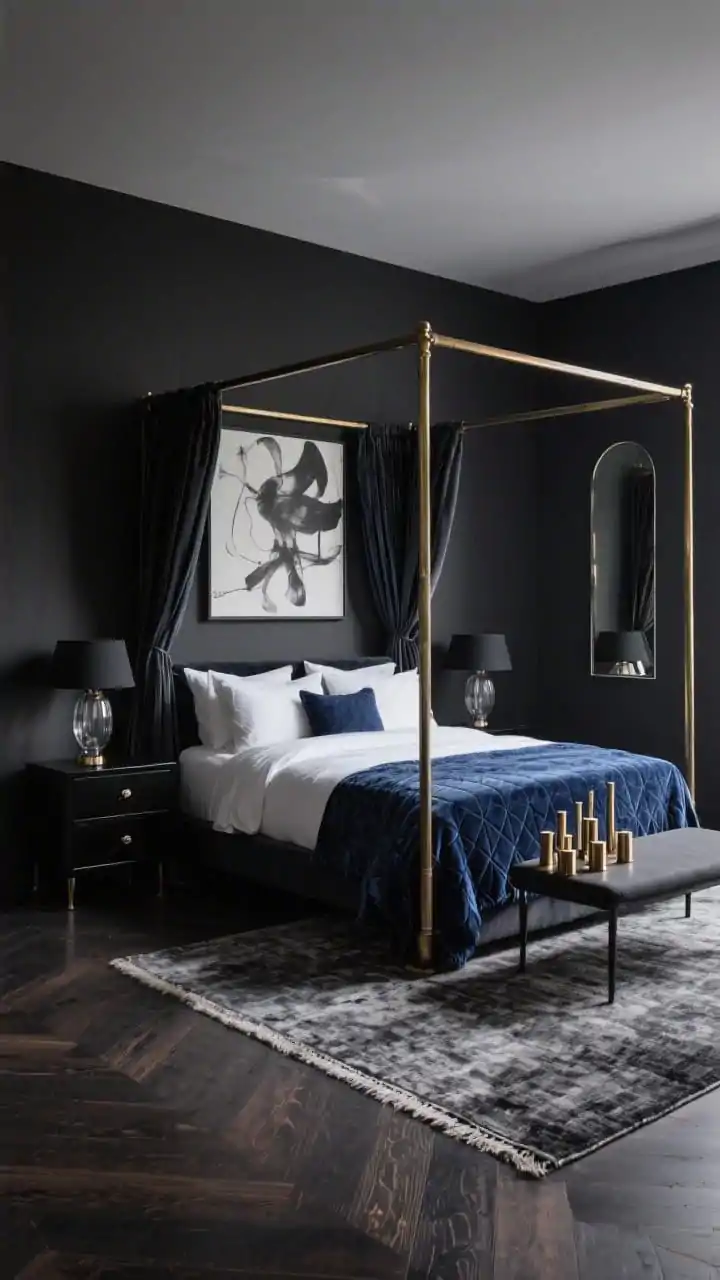 Medium-wide boutique-hotel vibe, corner angle: A moody monochrome bedroom wrapped in deep charcoal walls and matching drapery. Centered is a brushed brass canopy bed with crisp bedding and an inky blue velvet quilt. Black lacquer nightstands with matte black hardware, smoked glass lamps casting soft shadows. A large grayscale abstract canvas anchors the scene above a graphite Tibetan rug on dark-stained oak flooring. Subtle shimmer from a cluster of bronze candleholders; a thin metal-framed mirror reflects the cocooned space. Low, atmospheric lighting; photorealistic.
