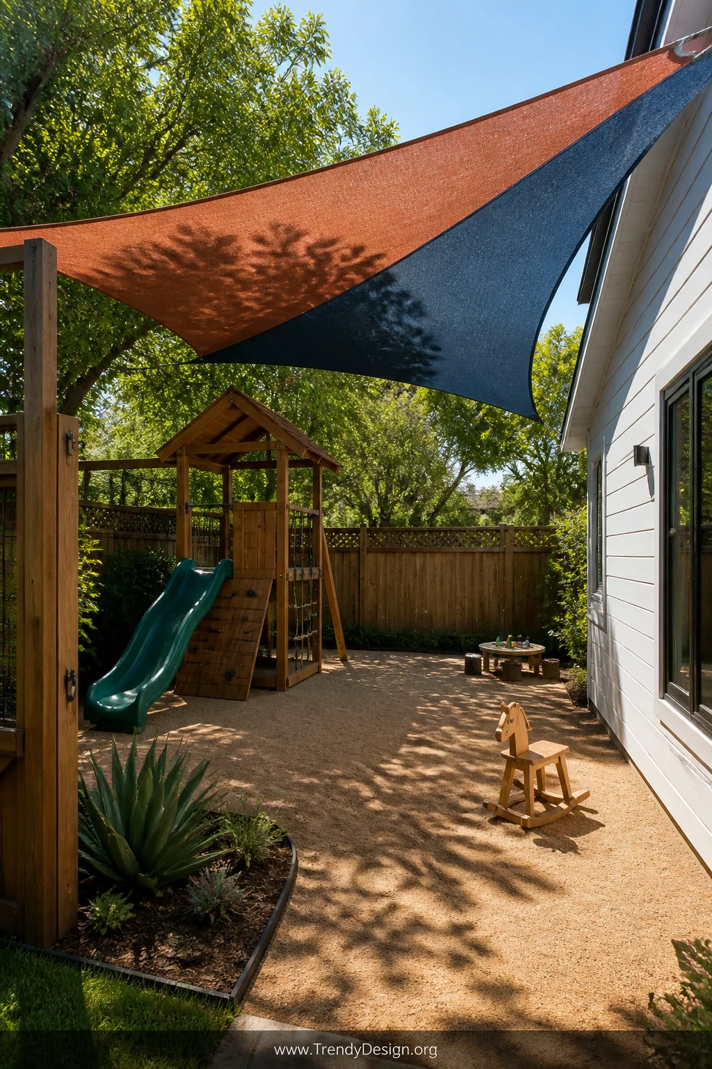 Wide-angle photorealistic shot of a sun-drenched backyard playground area covered by two overlapping triangular shade sails i
