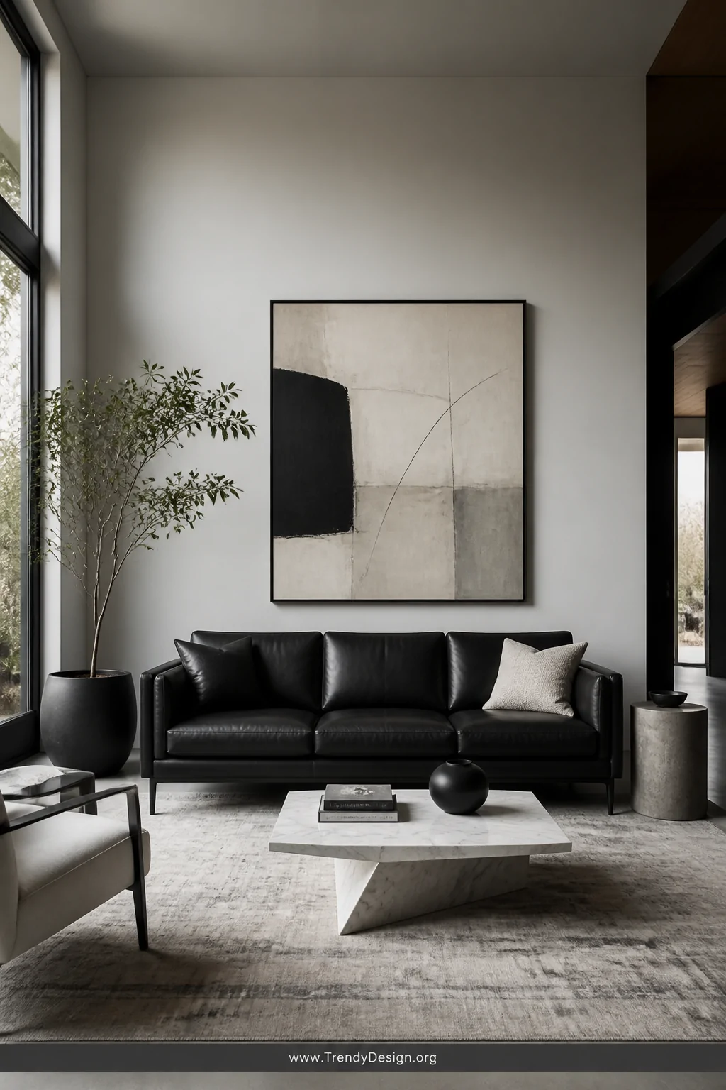 Wide-angle photorealistic interior shot of a sleek minimalist living room featuring a black leather couch centered against a 