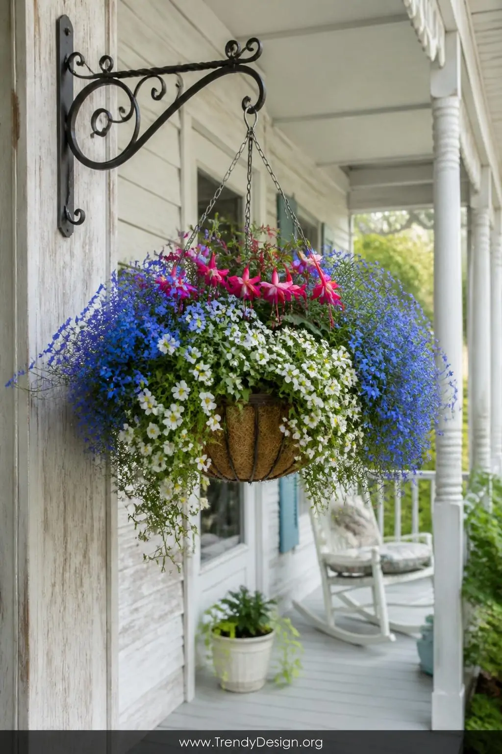 A medium-shot photorealistic image of a charming cottage-style front porch with a hanging wire basket overflowing in delicate