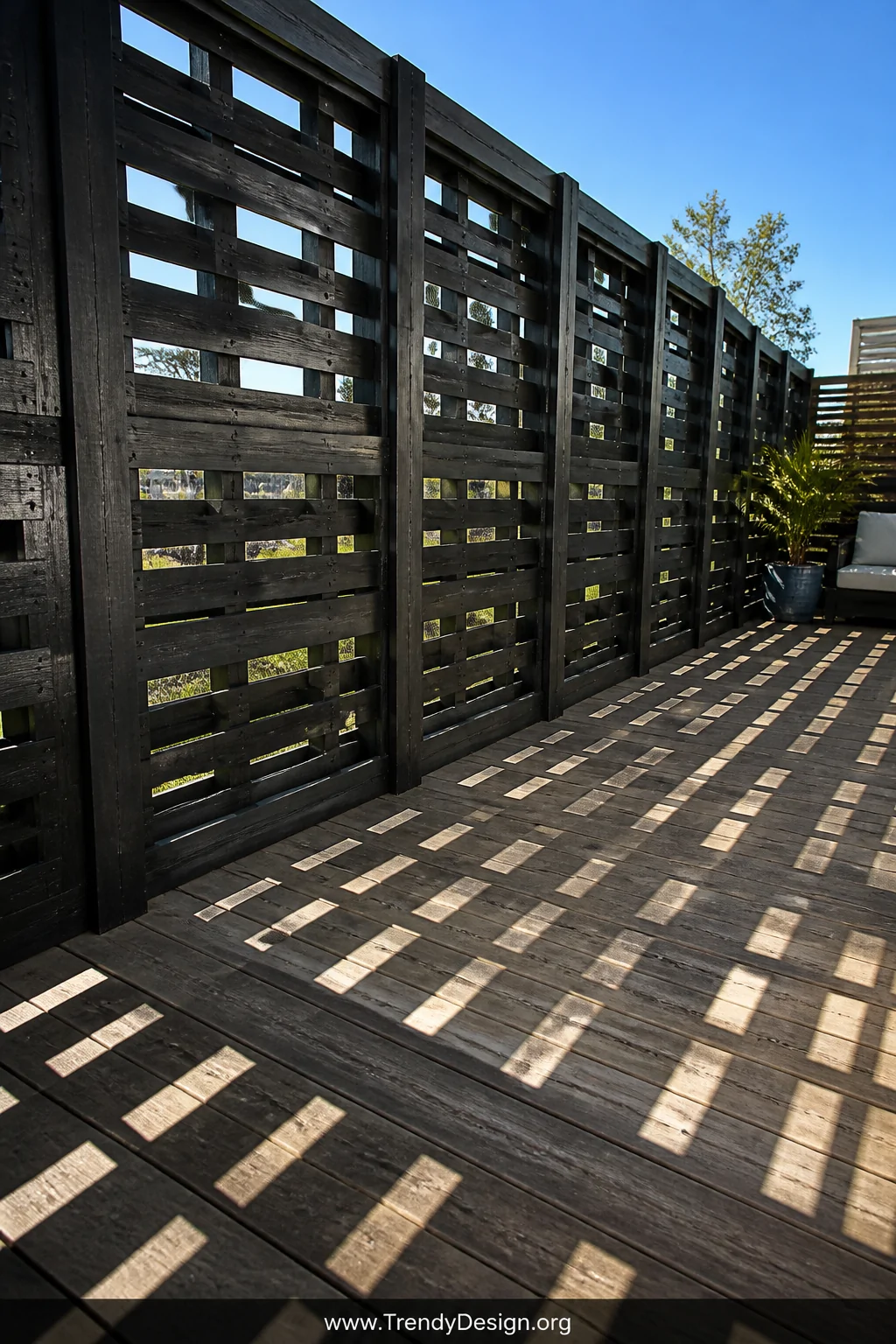 A wide photorealistic shot of a deck perimeter lined with whole pallet sections framed uniformly between dark posts and paint
