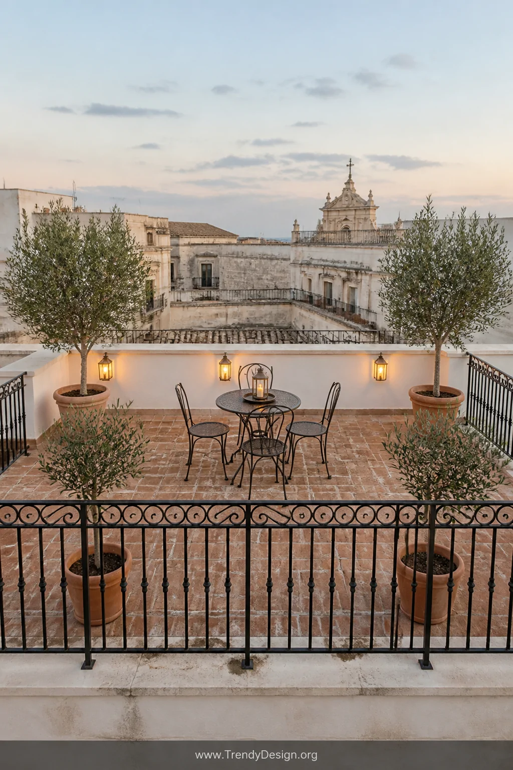 Wide photorealistic shot of a European-style flat roof terrace enclosed by ornate matte black wrought iron railings with clas