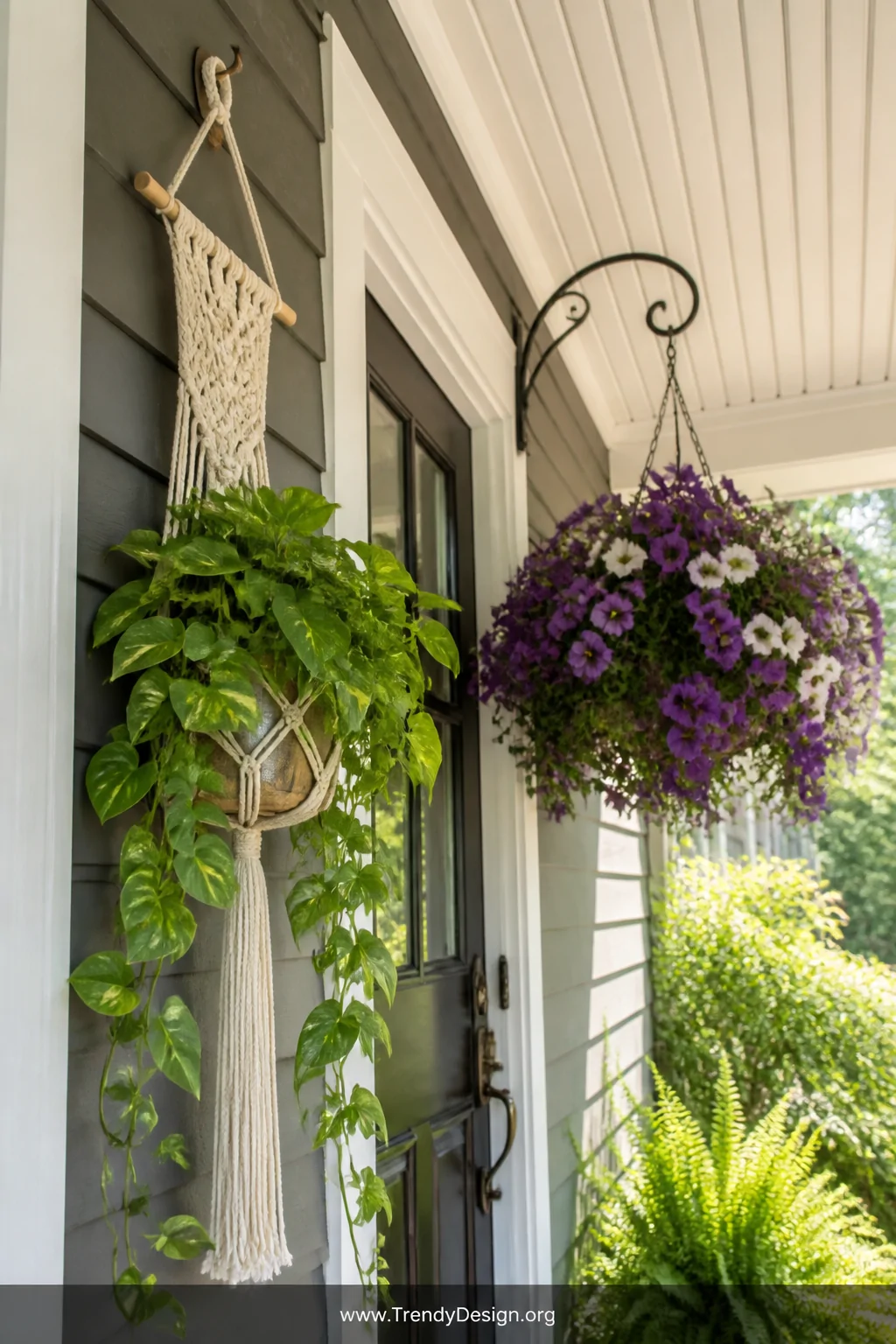 A medium-angle shot looking up slightly at a small front porch wall and ceiling corner where a macramé wall-mounted planter h