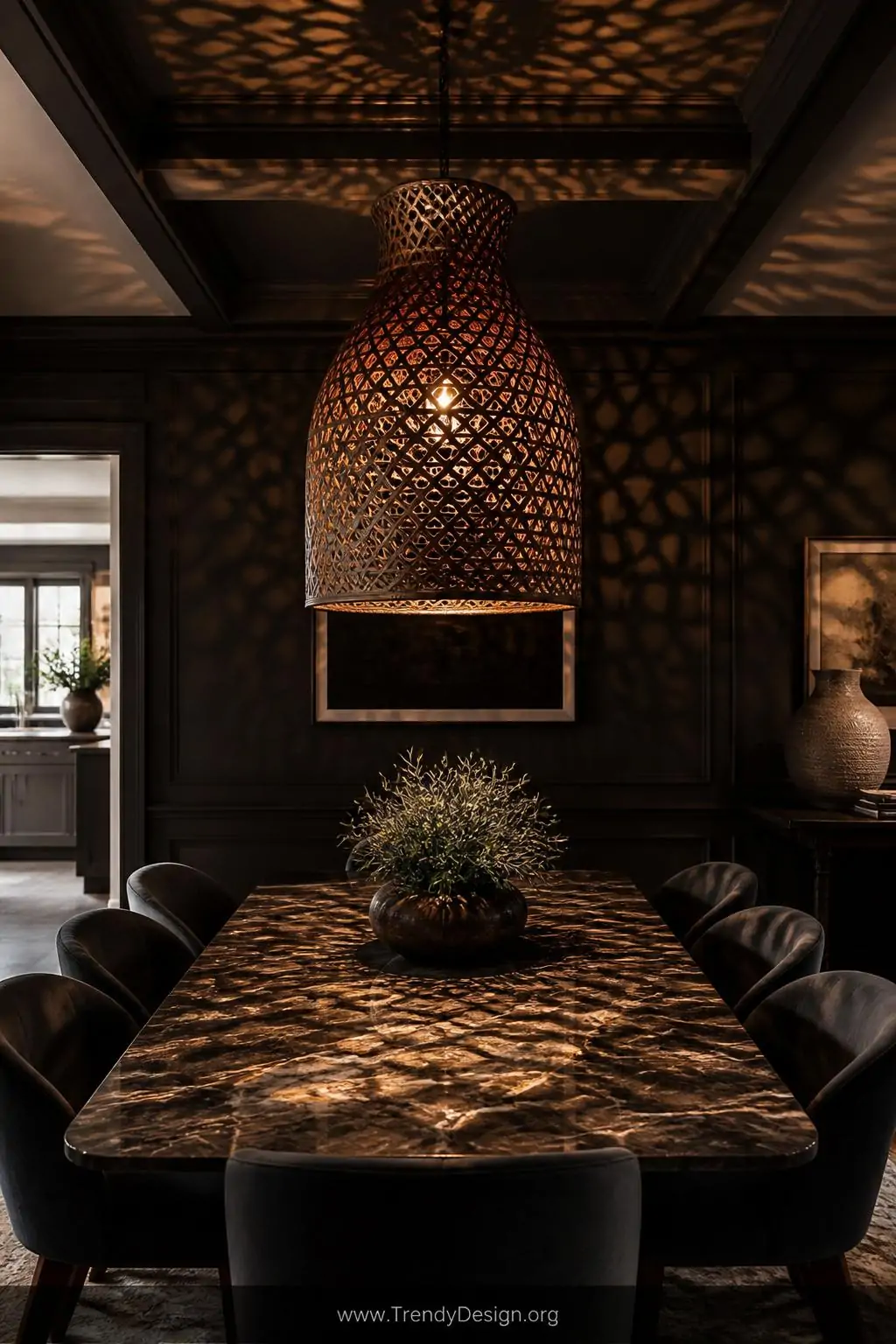Medium shot of a large dark-stained woven rattan pendant casting intricate dappled shadow lacework across deep espresso walls