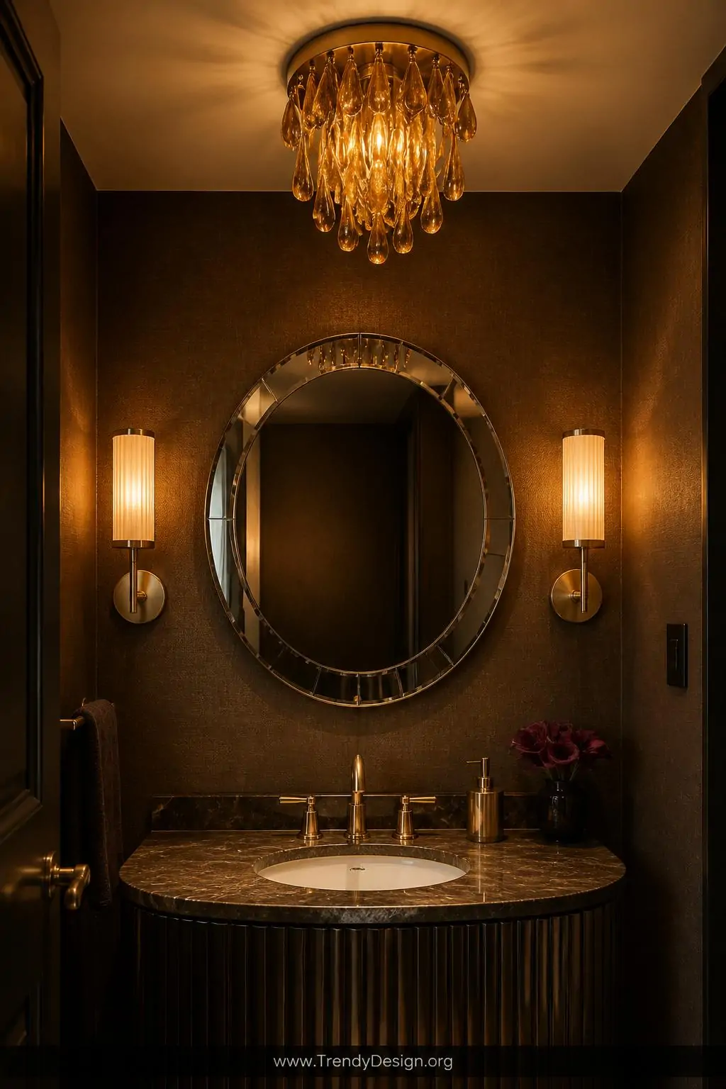 Medium shot of a jewel-box powder room with a sculptural art deco flush mount ceiling fixture dripping with amber glass dropl
