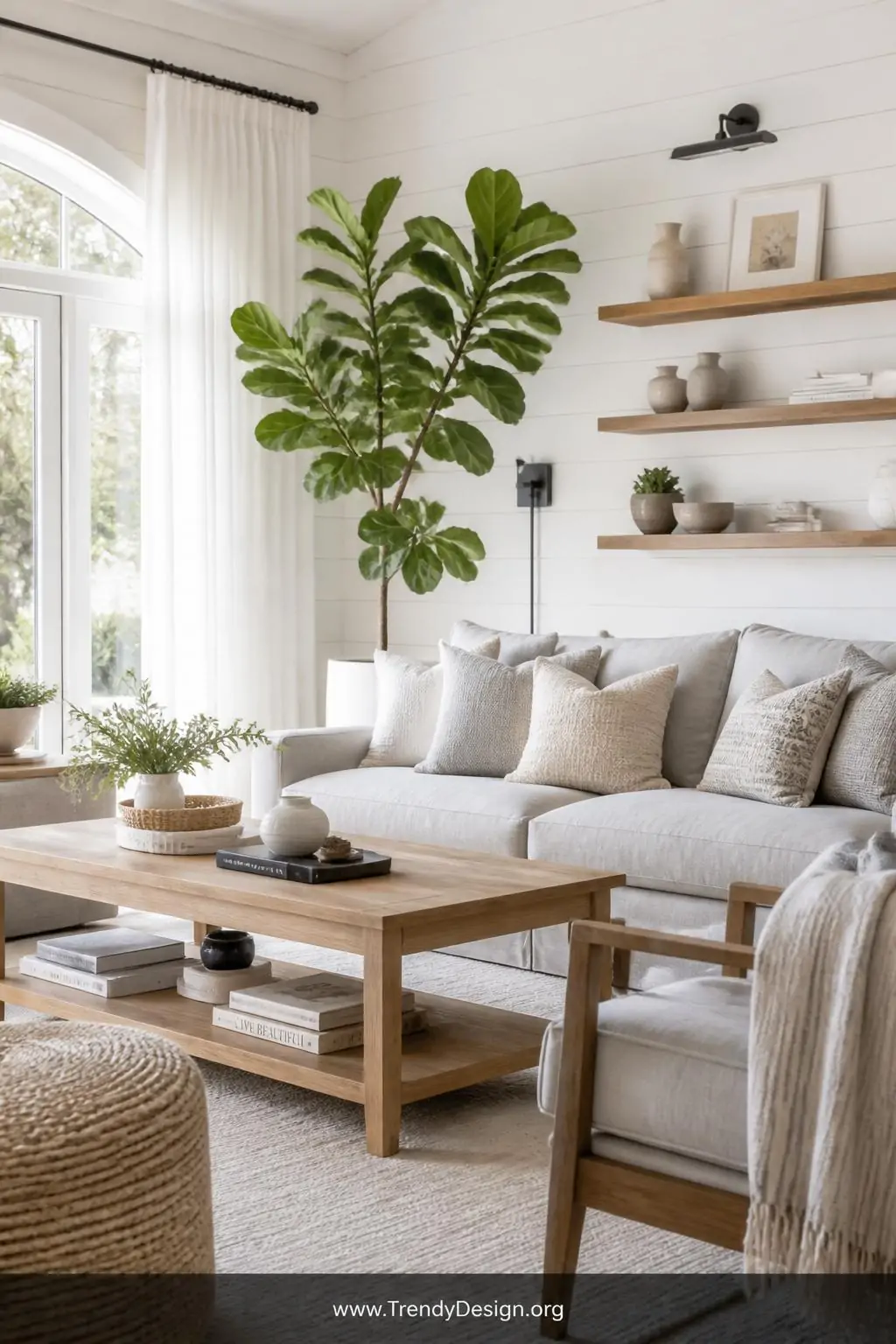 Wide-angle photorealistic interior design shot of a bright Scandinavian-inspired family room with crisp white shiplap walls, 