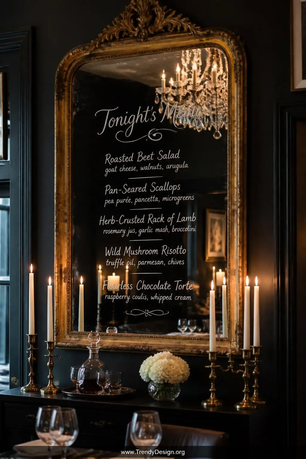 A medium-shot photorealistic dining room scene featuring a large ornate antique mirror mounted on a deep charcoal-painted wal
