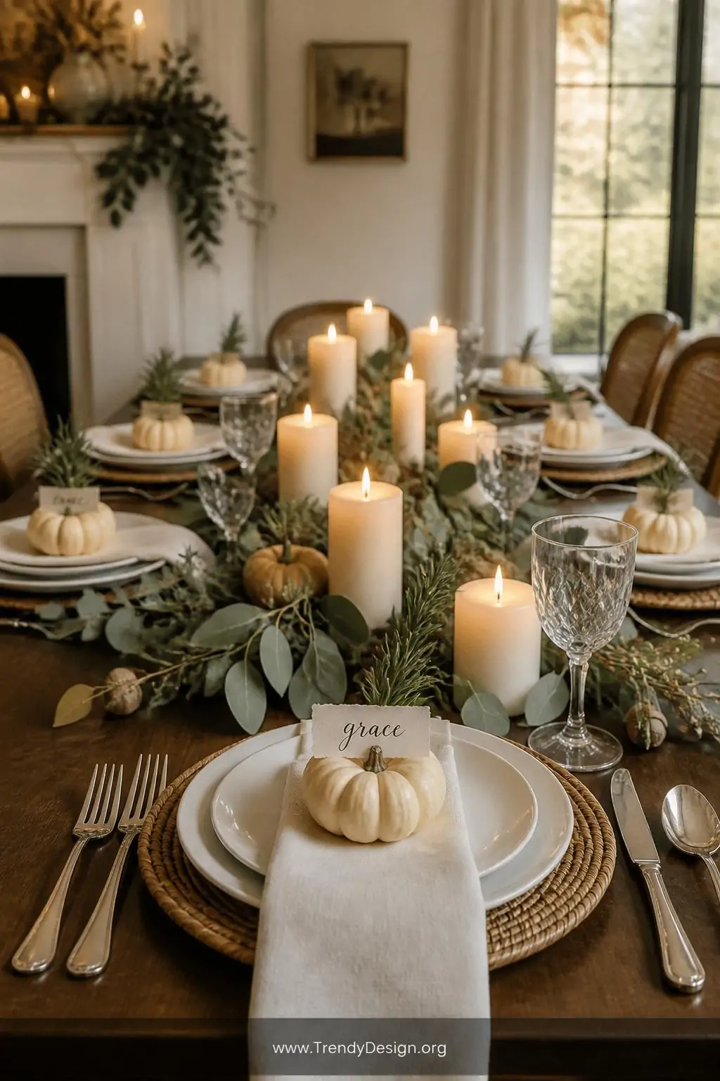 A wide-shot photorealistic interior of a styled autumn dinner table featuring mini pumpkins as place card holders at each set