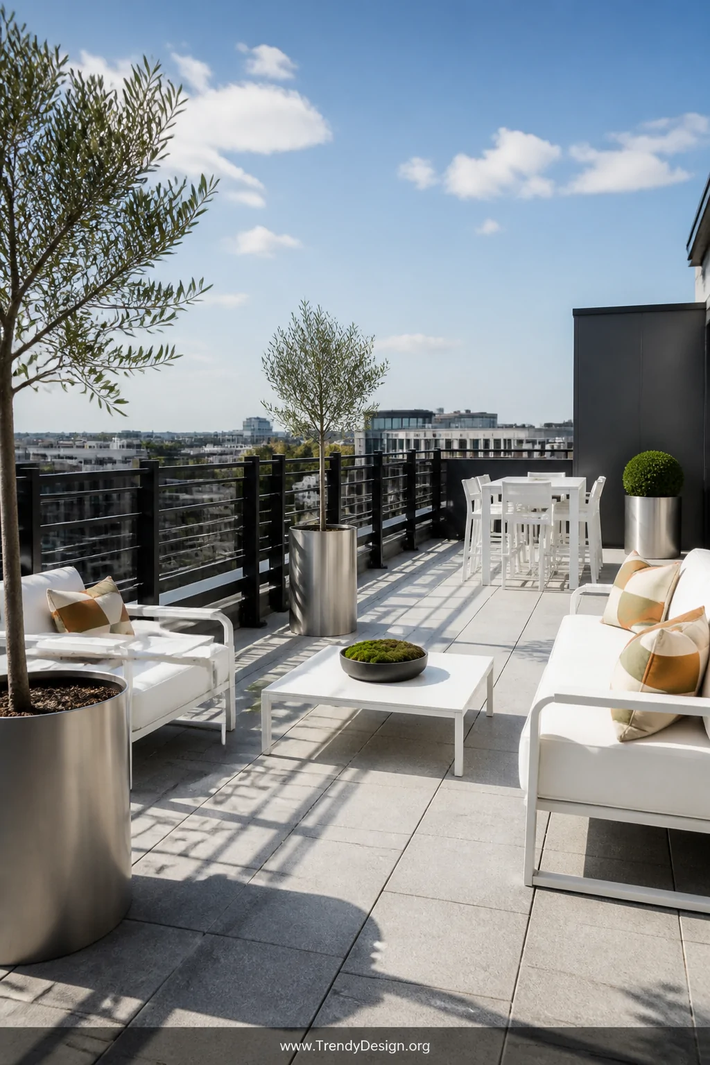 Wide-angle photorealistic shot of a versatile rooftop terrace enclosed by clean matte charcoal powder-coated aluminum railing
