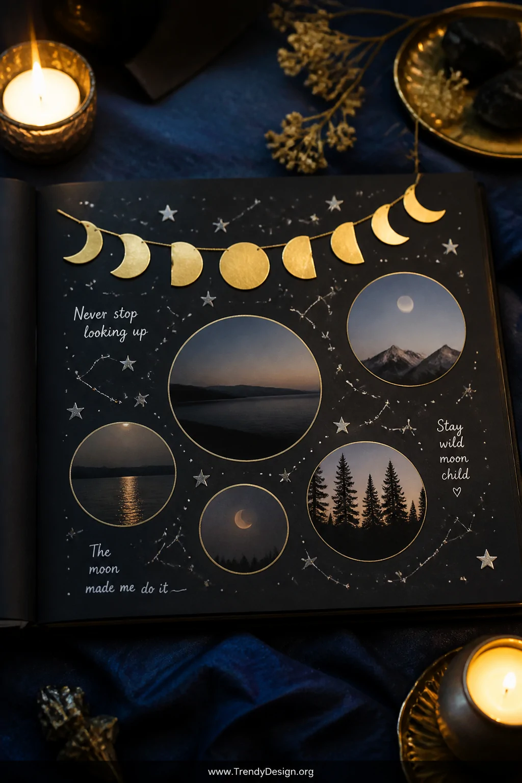 A medium-shot photorealistic interior flat-lay of an open black scrapbook on a navy linen cloth surface under warm golden can