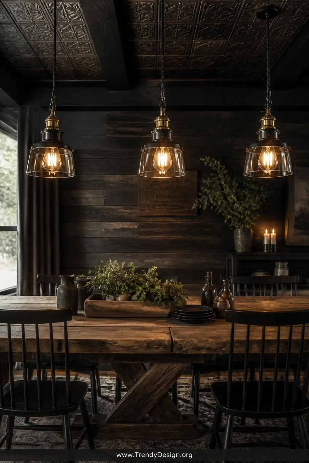 Wide shot of three matching vintage industrial pendants with aged brass fittings, exposed hardware, and classic porcelain soc