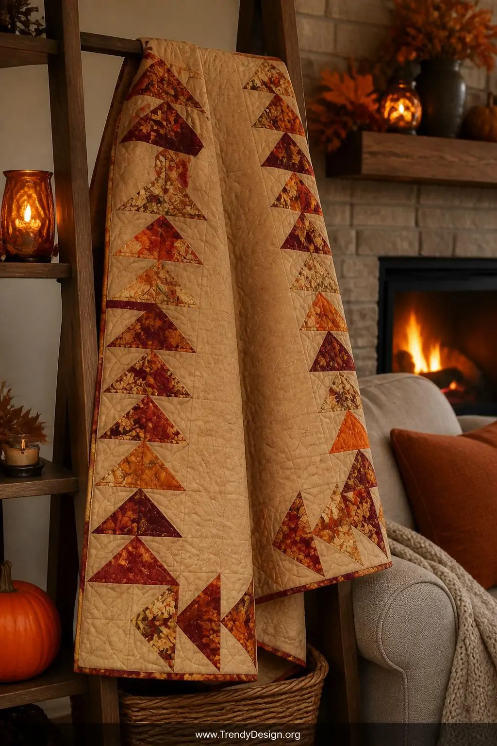 Medium shot of a cozy autumn throw quilt draped over a wooden ladder shelf in a warm fall-decorated living room, flying geese