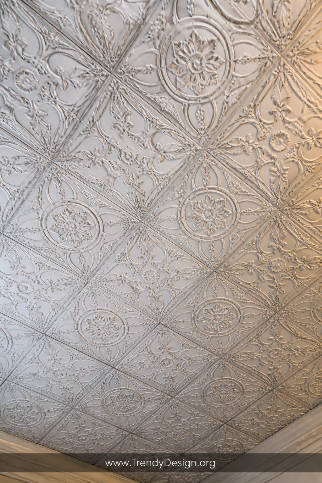 Closeup photorealistic detail shot of a ceiling attic access door completely camouflaged by a seamless pattern of ornate pres