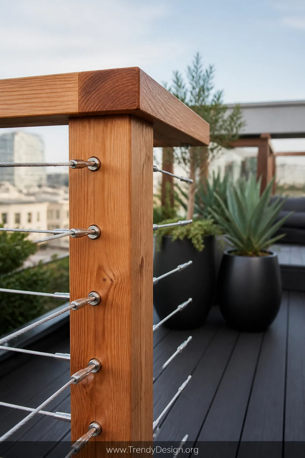 Close-up photorealistic shot of a custom mixed-material rooftop railing combining chunky natural wood posts with taut stainle