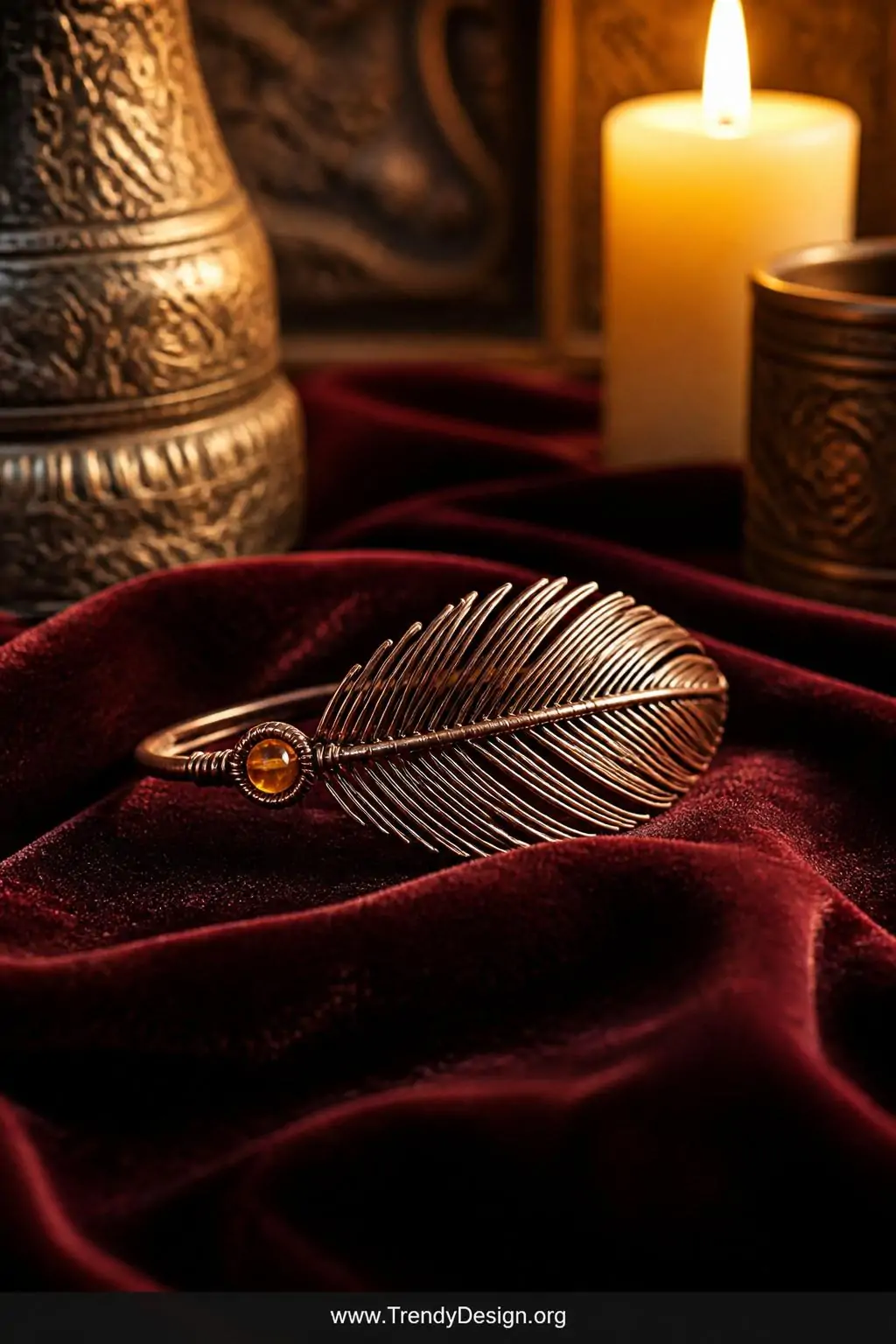 A close-up shot of a boho feather wire ring crafted in oxidized copper with delicate individual barbs fanning symmetrically o