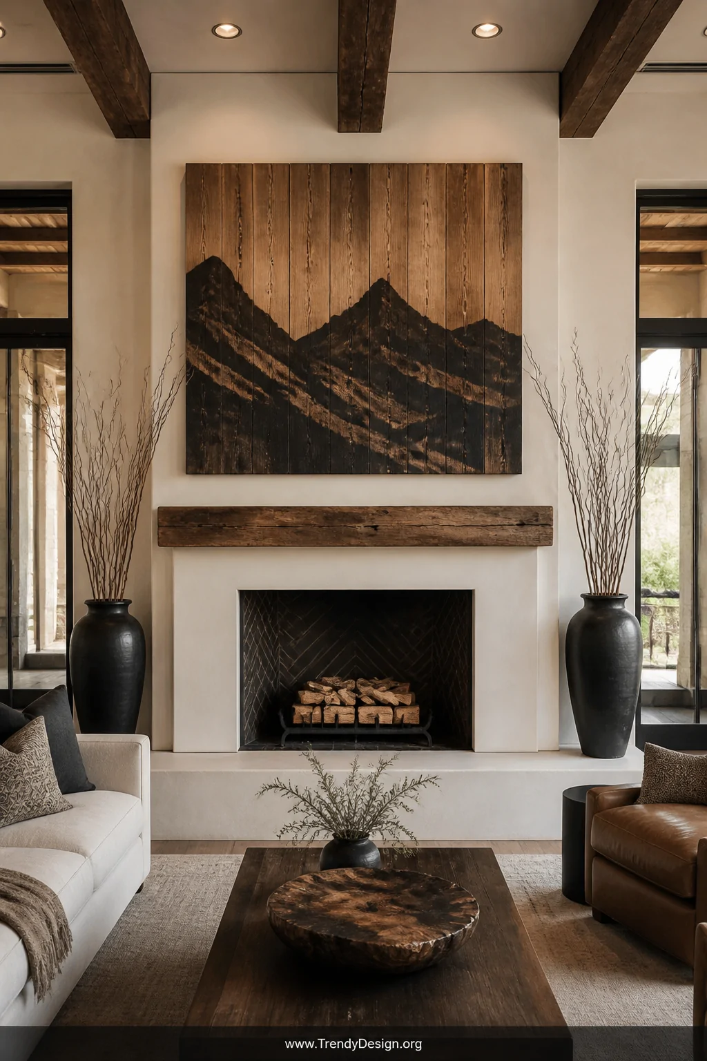 A dramatic living room focal point above a white plaster fireplace mantle featuring a large reclaimed fence board panel with 