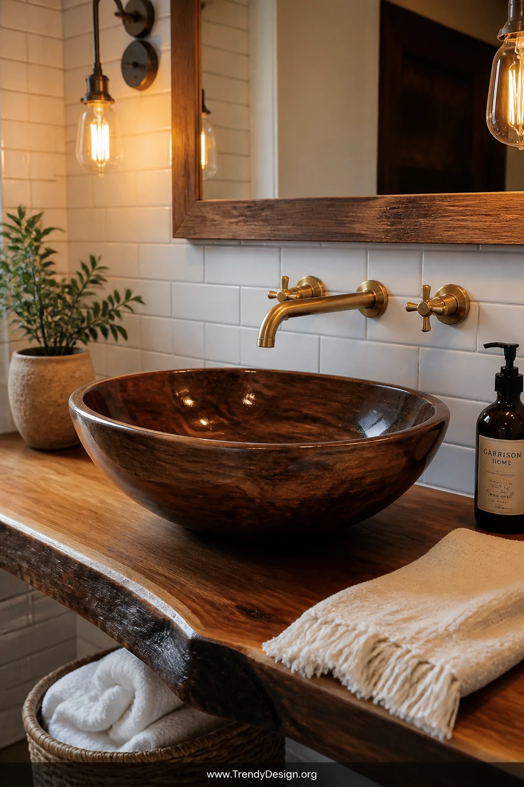 A medium shot of a polished walnut hardwood bowl vessel sink mounted on a floating bathroom vanity, its rich dark grain gleam