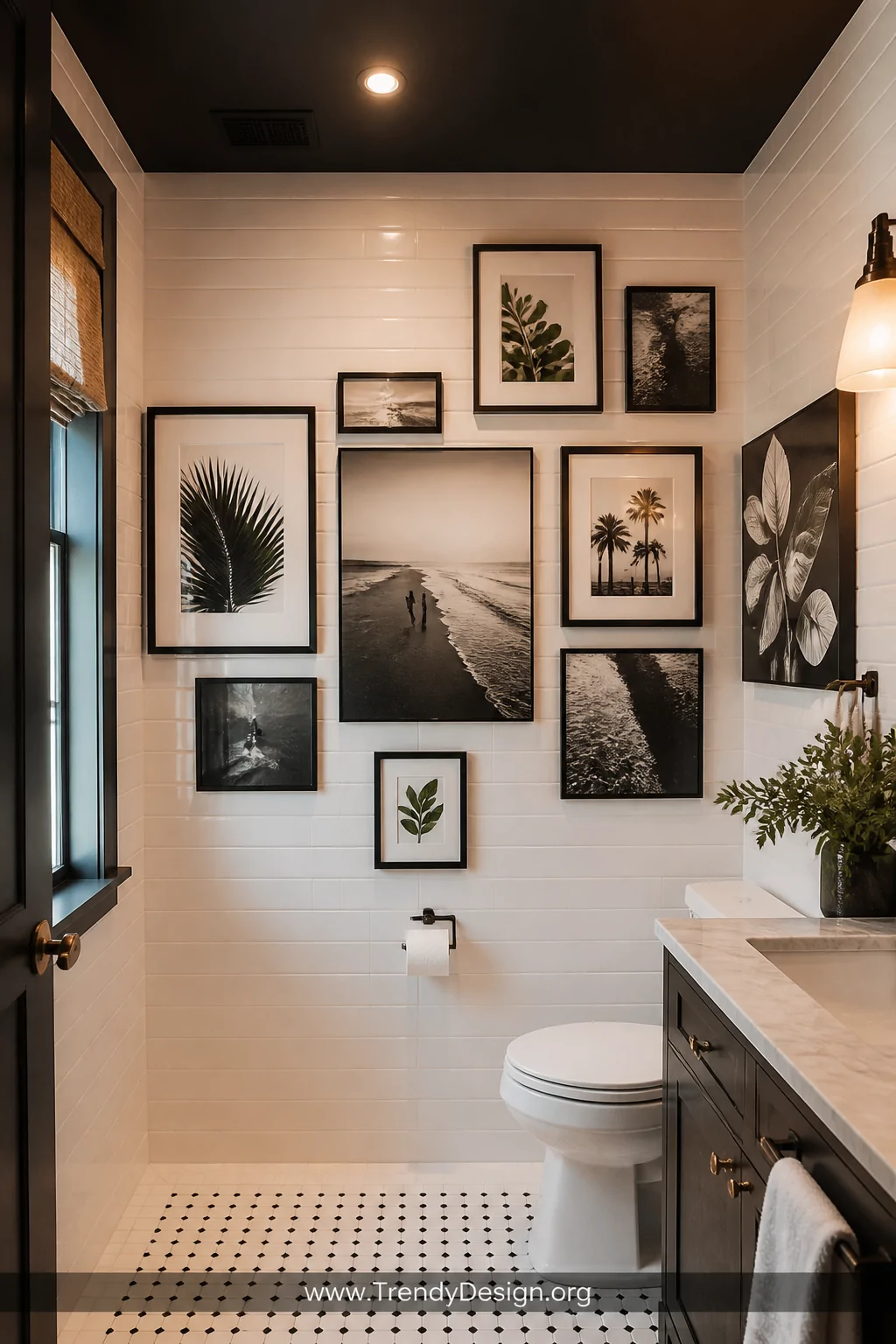 A photorealistic wide shot of a small boutique-hotel-style bathroom featuring a curated gallery wall with mixed-size black-an