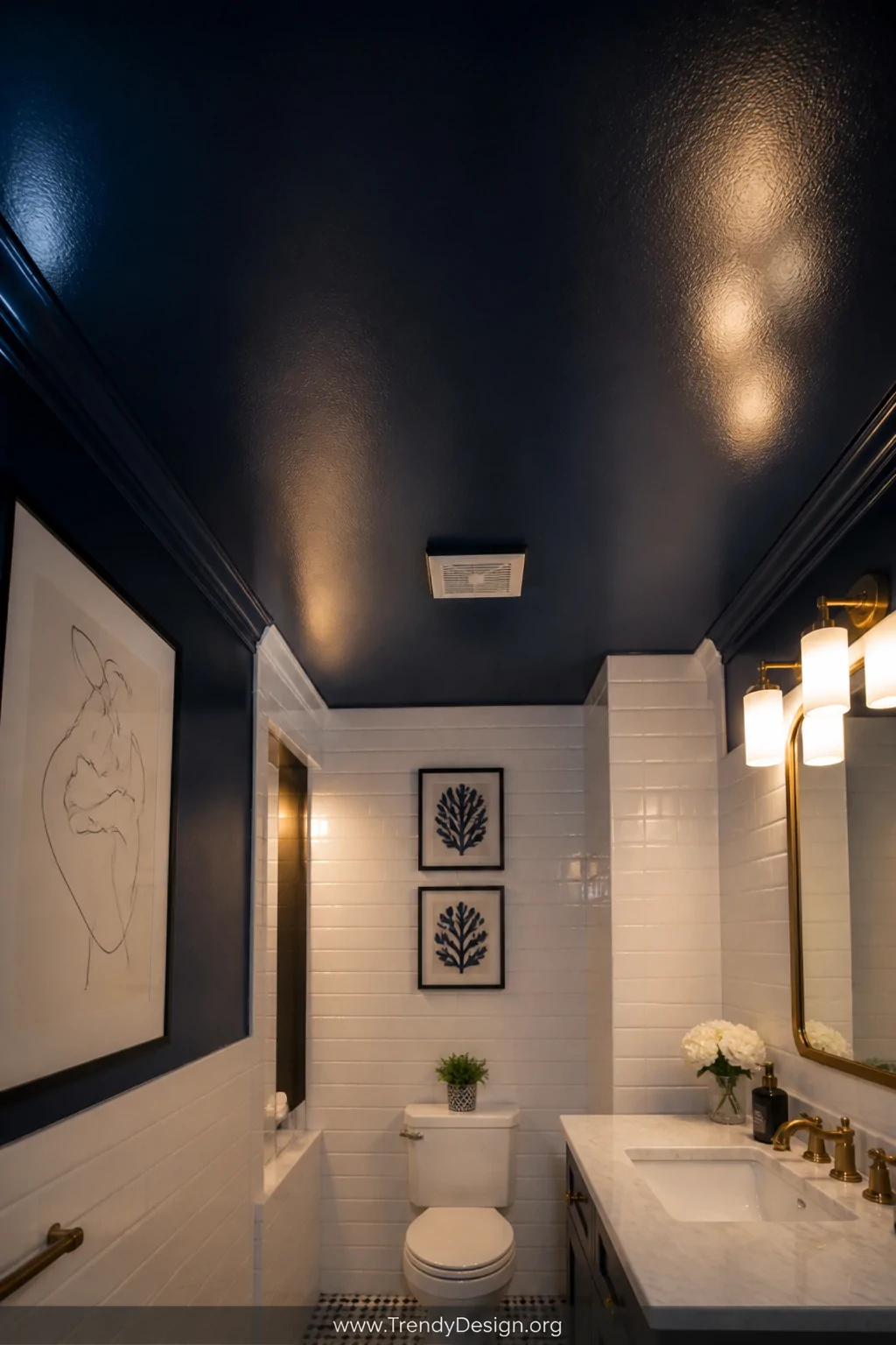 A wide shot of a small bathroom looking upward to reveal a dramatic deep navy blue moisture-resistant glossy painted ceiling 