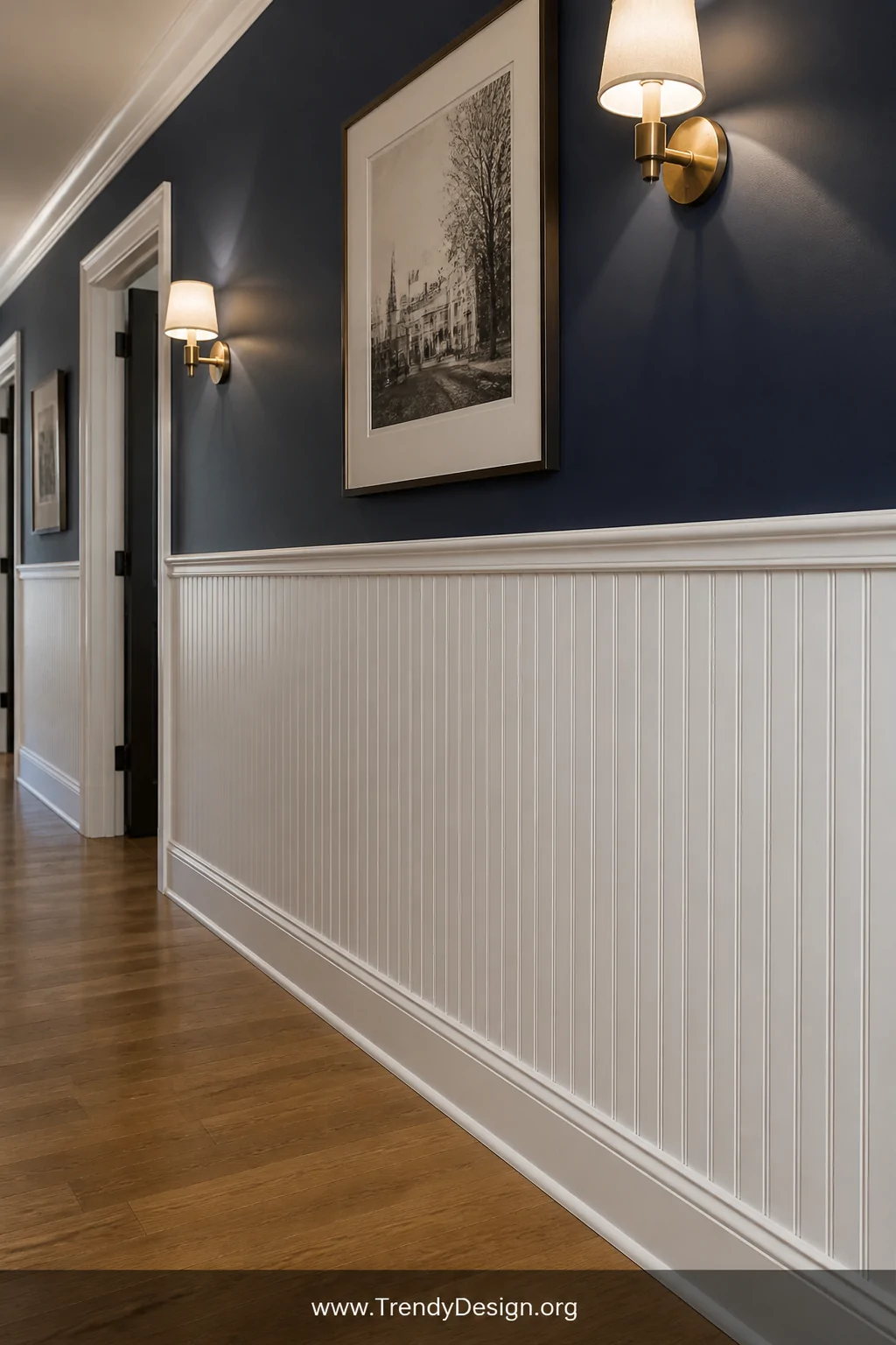 A classic white beadboard wainscoting panel running halfway up a hallway wall, capped with a crisp chair rail molding, the up