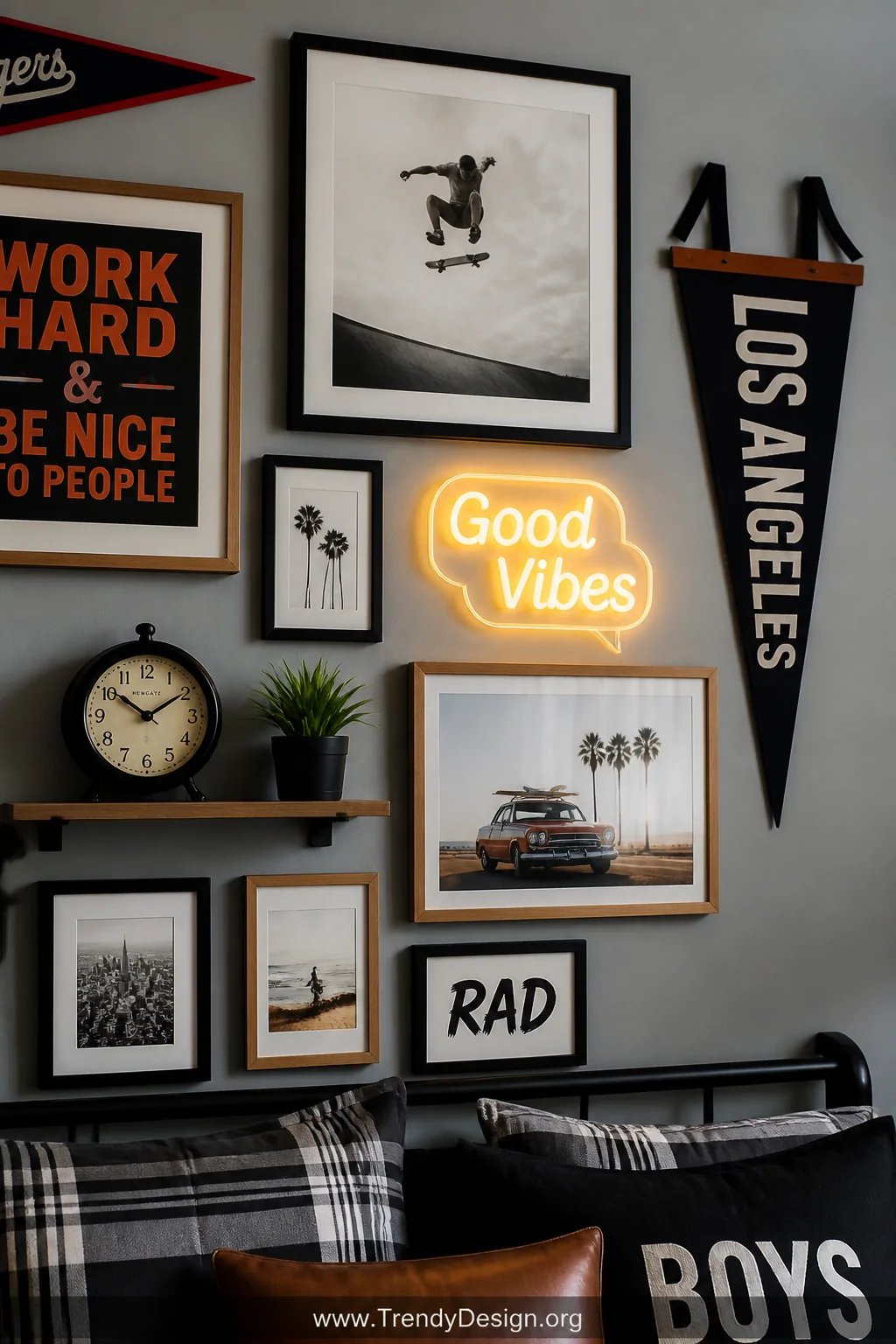 Close-up detail shot of a boys bedroom gallery wall featuring an eclectic mix of black wooden frames and natural wood frames 