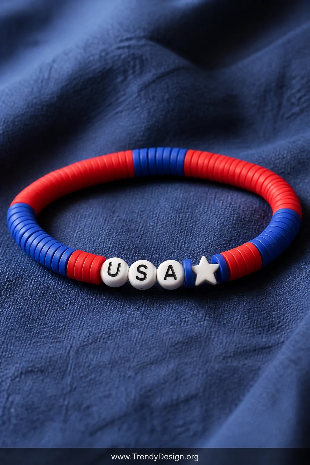 A close-up shot of a clay bead bracelet spelling 