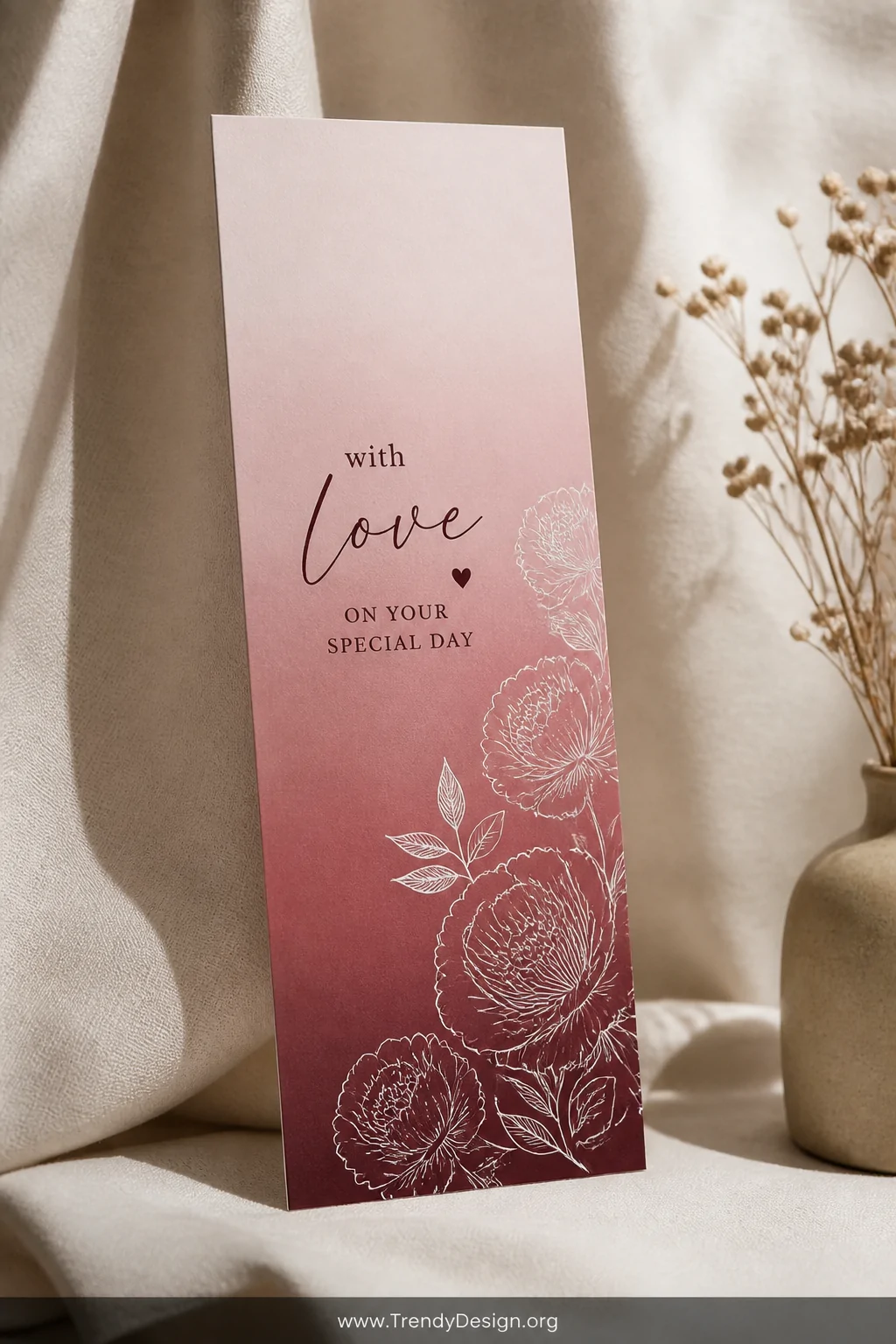 A medium shot of a tall slimline card propped against a soft linen backdrop, displaying a seamless monochromatic gradient flo