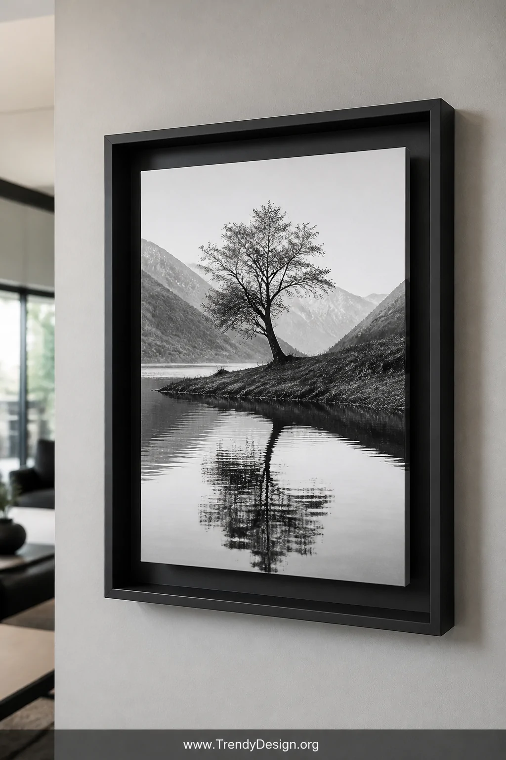 Close-up shot of a matte black outer frame enclosing a minimalist floating frame inside, the canvas print suspended slightly 