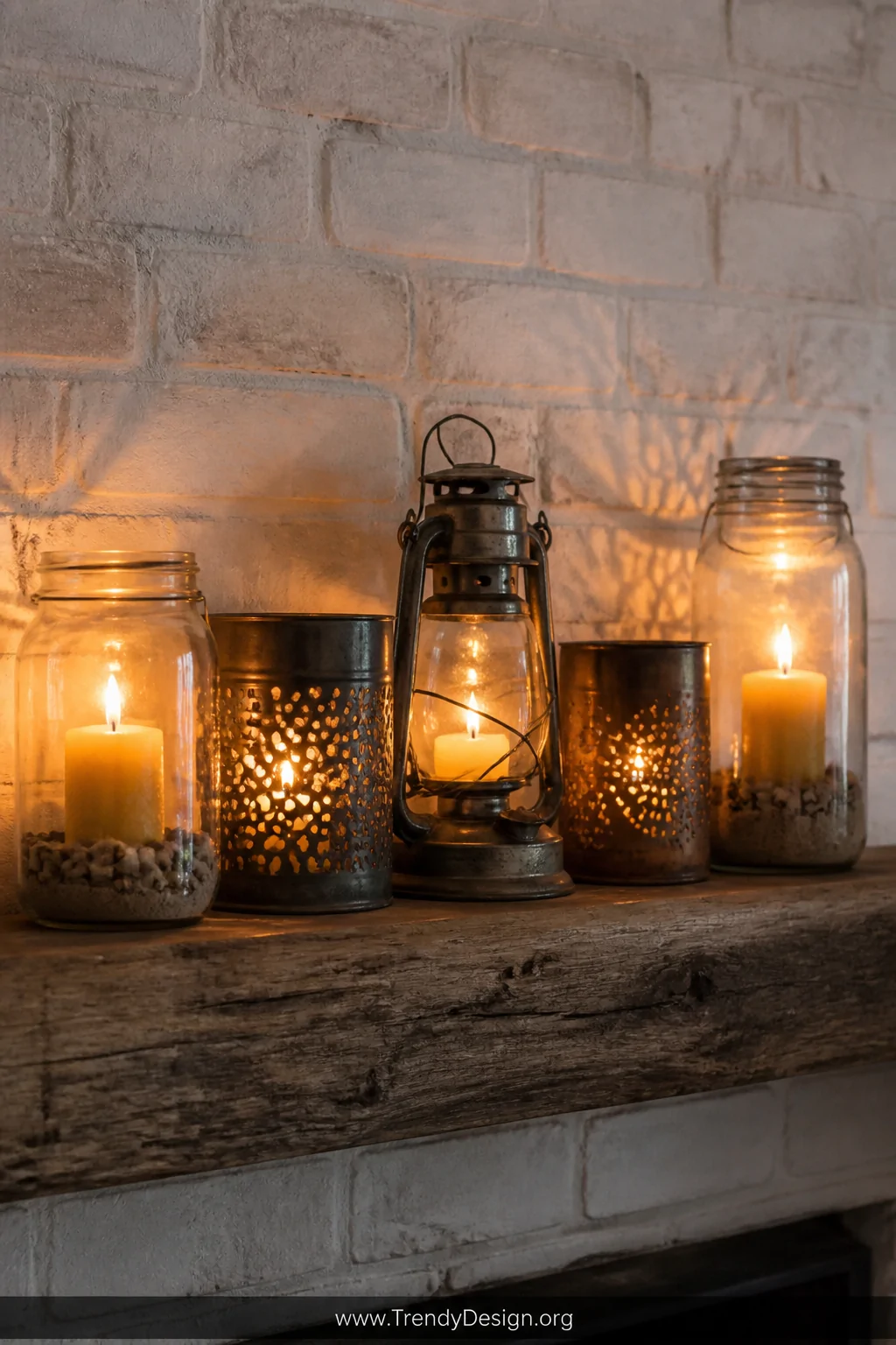 Medium shot of a wooden mantel styled with a grouped arrangement of five lanterns in varying sizes   mason jars, punched tin 