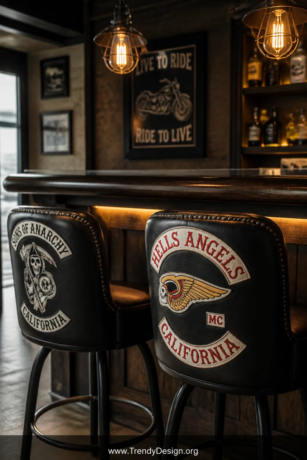 Closeup detail shot of two leather bar stools at a dark wood home bar counter, each seat cover featuring bold embroidered mot