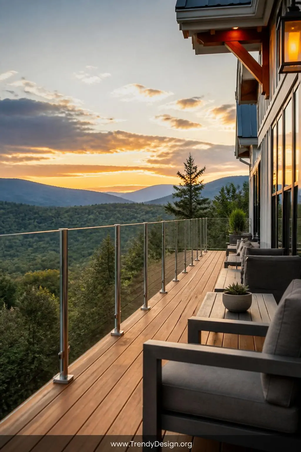 Wide-angle photorealistic shot of an elevated modern farmhouse deck at golden hour, featuring seamless full-panel clear plexi