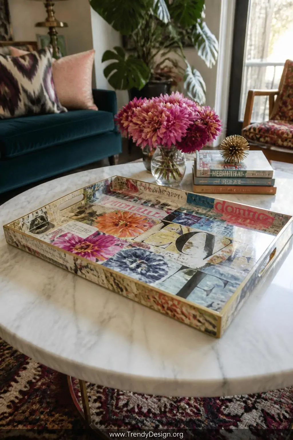 Decoupage magazine collage tray with bold typography and colorful patterns sealed under glossy Mod Podge finish, sitting on a marble-top coffee table, eclectic bohemian living room, natural afternoon light streaming from nearby window highlighting the layered torn paper edges, medium shot.