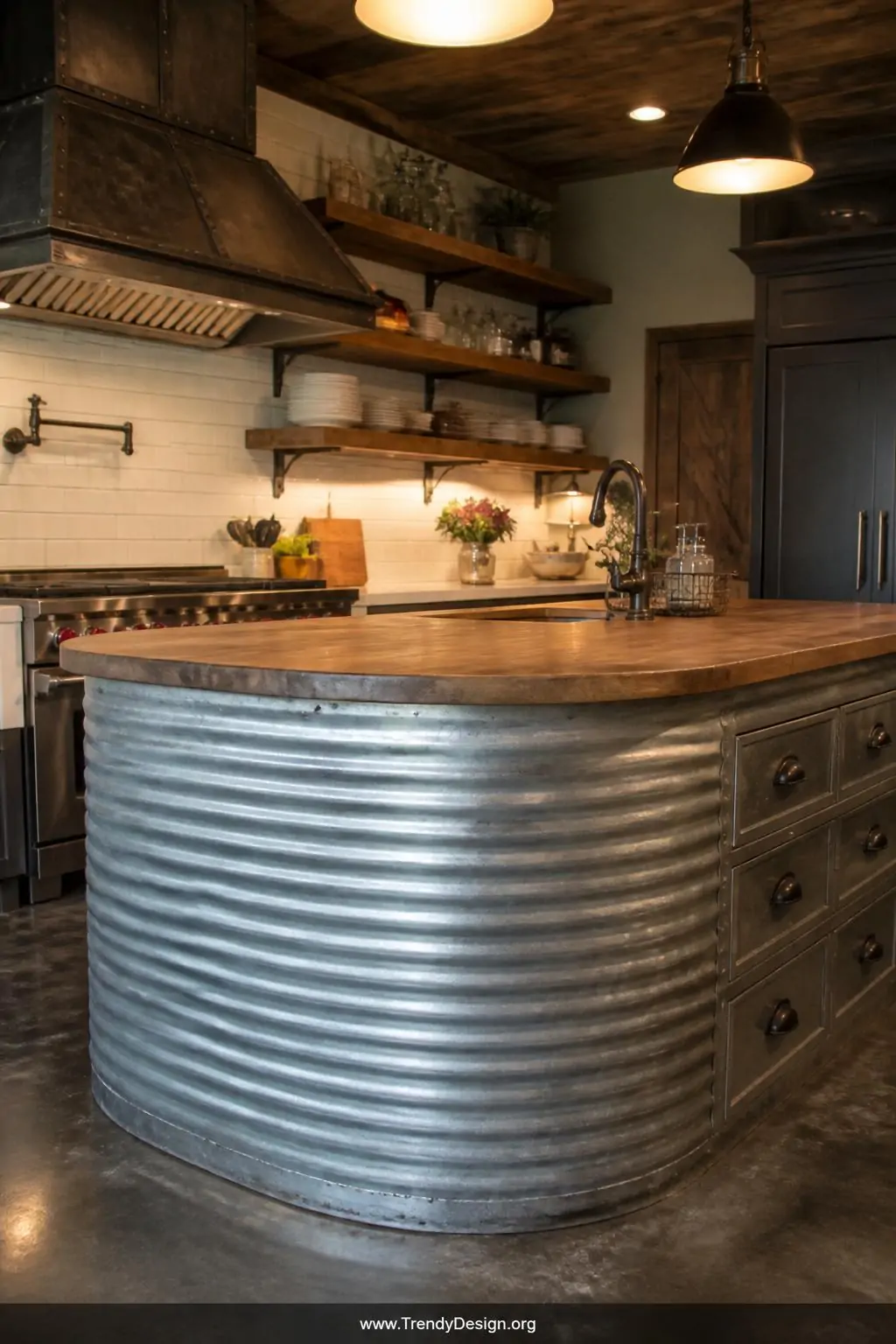 Kitchen island wrapped in curved corrugated grain bin siding panels topped with a thick butcher block surface, medium shot, raw sealed metal base with vintage barn-style drawer pulls, open wooden shelving above, warm ambient pendant lighting, industrial farmhouse kitchen, photorealistic interior design.