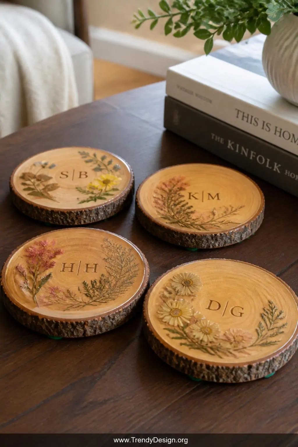Closeup shot of four polished wood slice coasters arranged on a dark walnut coffee table, smooth sanded surfaces sealed in gl