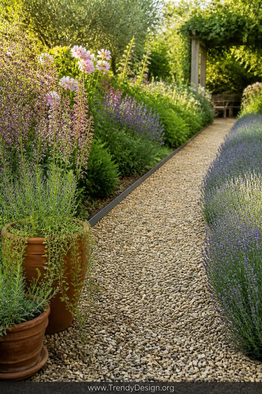 Medium photorealistic shot of a polished rustic garden gravel path using warm honey-toned pea gravel bordered by crisp dark s