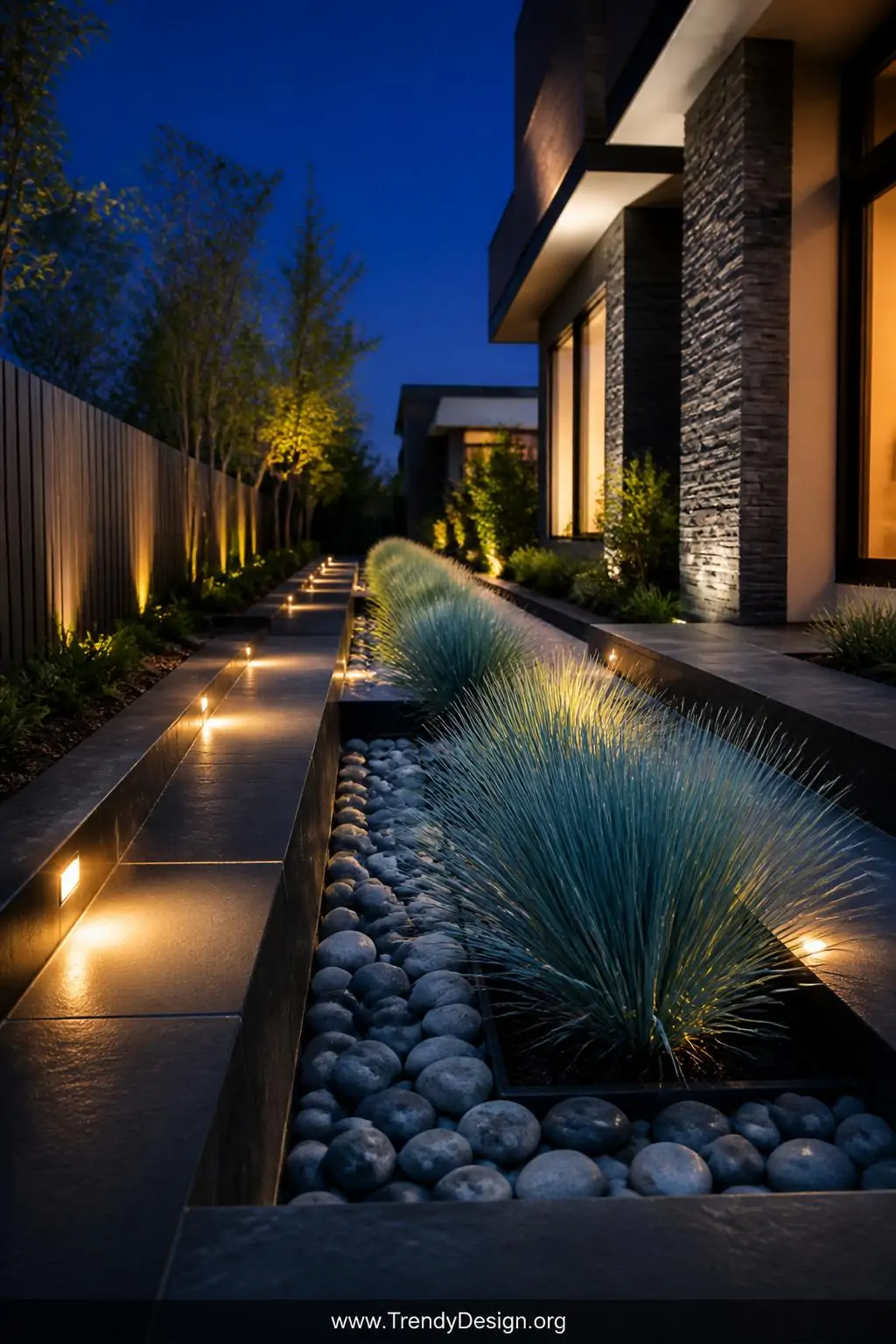 A medium shot of a sleek modern channel rain garden at twilight alongside a contemporary home, sharp rectangular basins lined