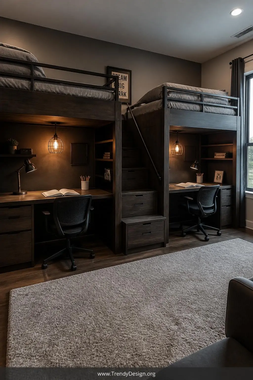 Two dark-stained wood loft beds with built-in desk stations underneath in a shared kids bedroom, modern style, wide shot showing each desk fitted with a task lamp, pencil cup, and open textbooks, elevated sleeping platforms with fitted grey bedding above, warm pendant lighting glowing over each workspace, photorealistic interior design.