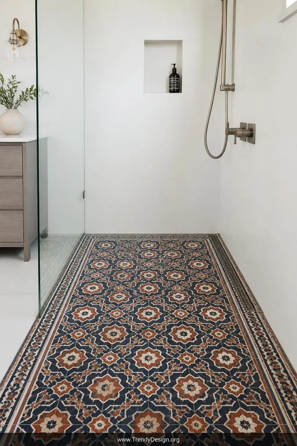 Intricate navy and terracotta Mediterranean mosaic tile floor inside a walk-in shower with stark minimalist white flat walls, small geometric patterned tiles commanding full visual attention against the clean bright surround, wide shot from above, photorealistic interior design.
