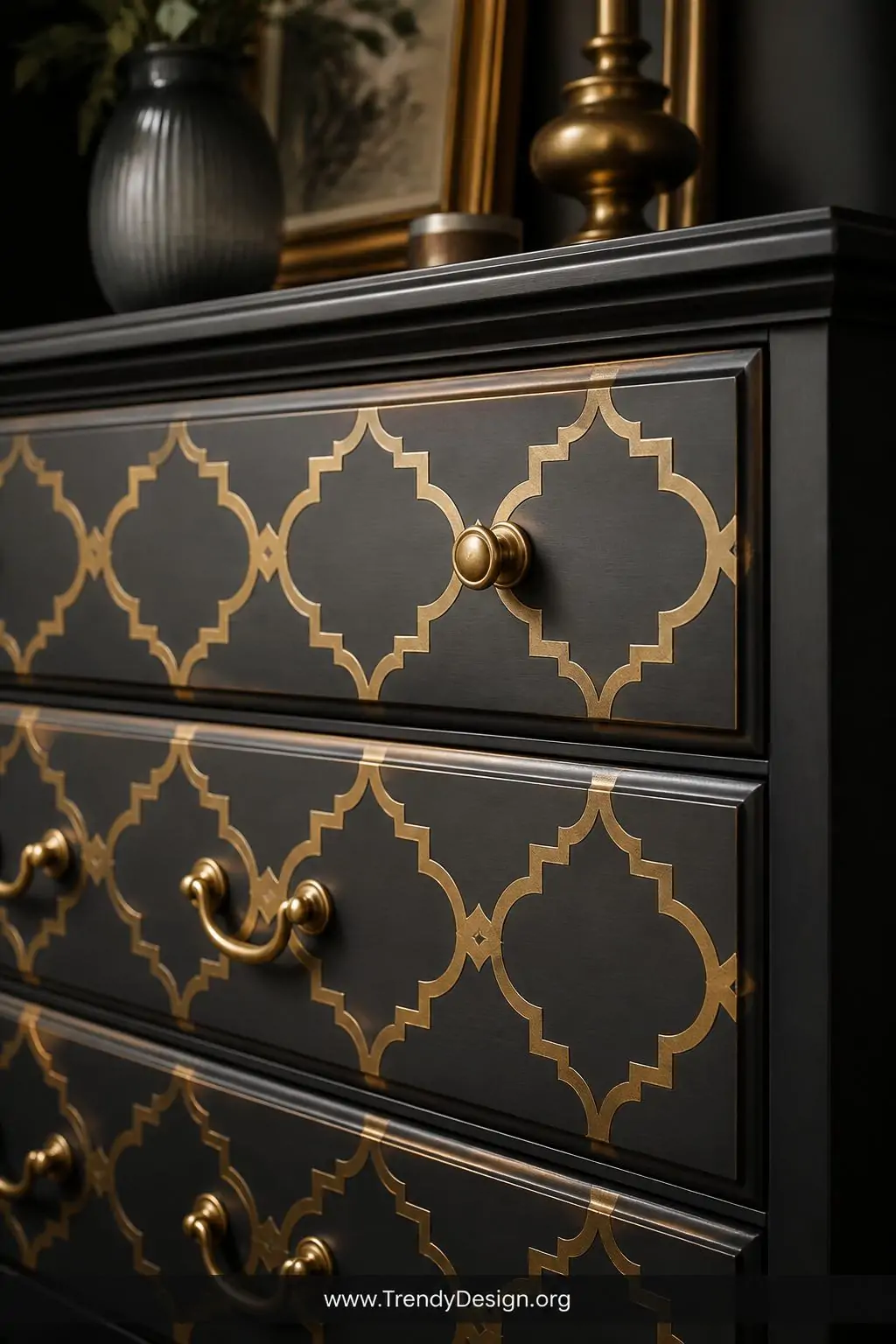 A closeup photorealistic interior design image of a dresser drawer front painted in matte charcoal chalk paint layered with a