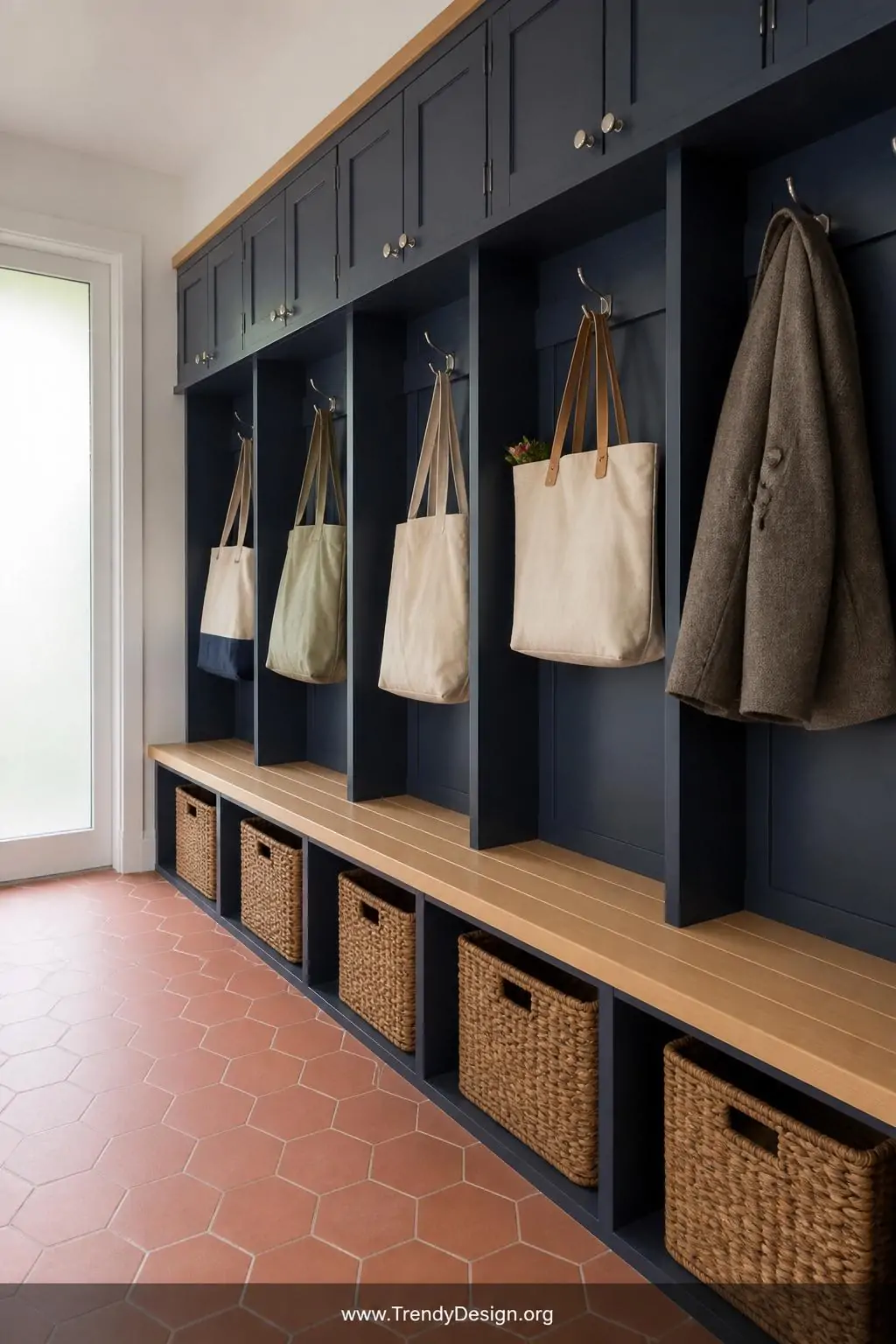 Wide-angle photorealistic interior shot of a hardworking under-stair mudroom system featuring six individual family cubbies i