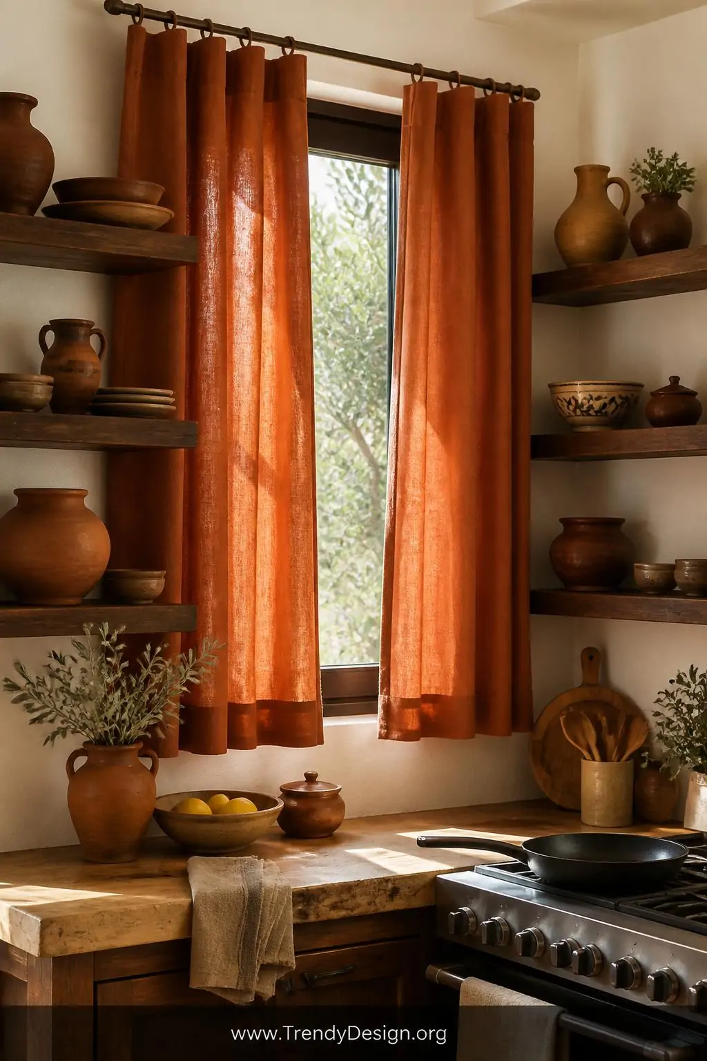 Photorealistic wide-shot warm kitchen glowing with natural light, solid terracotta linen curtain panels hanging at a window f