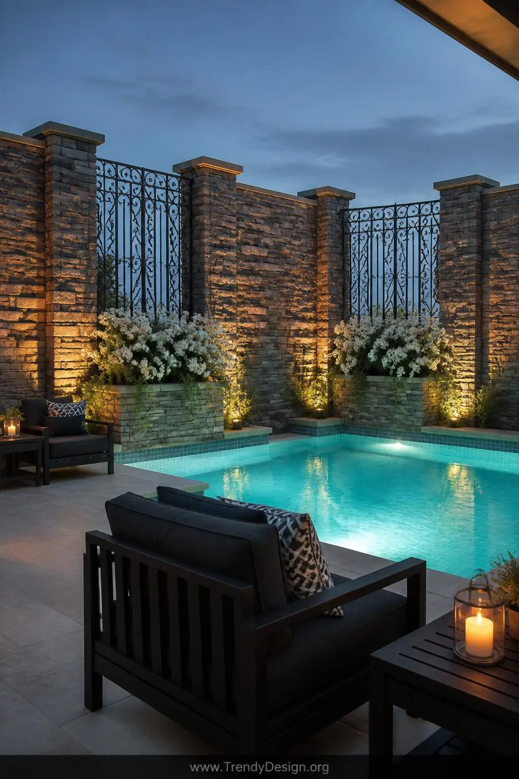 Wide photorealistic shot of a grand outdoor pool room fully enclosed by a stacked natural fieldstone wall in layered charcoal