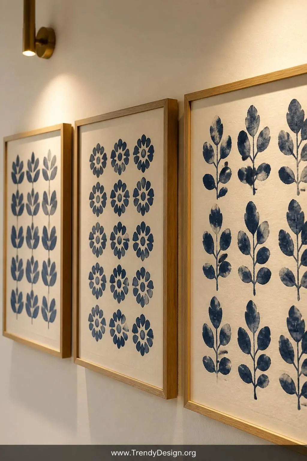 A close-up photorealistic gallery wall shot featuring three matching framed prints on a warm white wall, each displaying a si